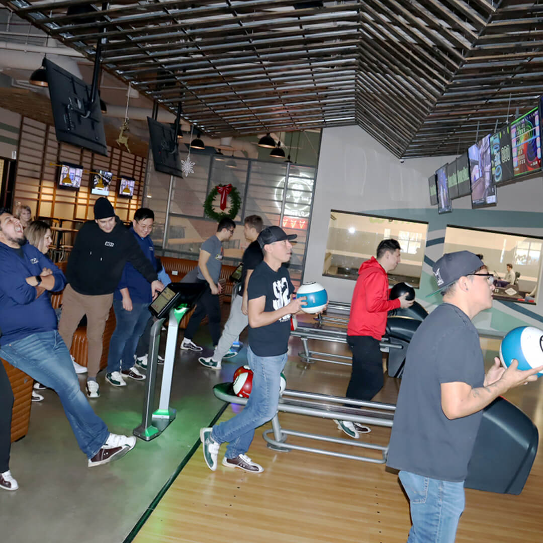 BOF's 2024 trip to Whirlyball. BOF staff members bowling.