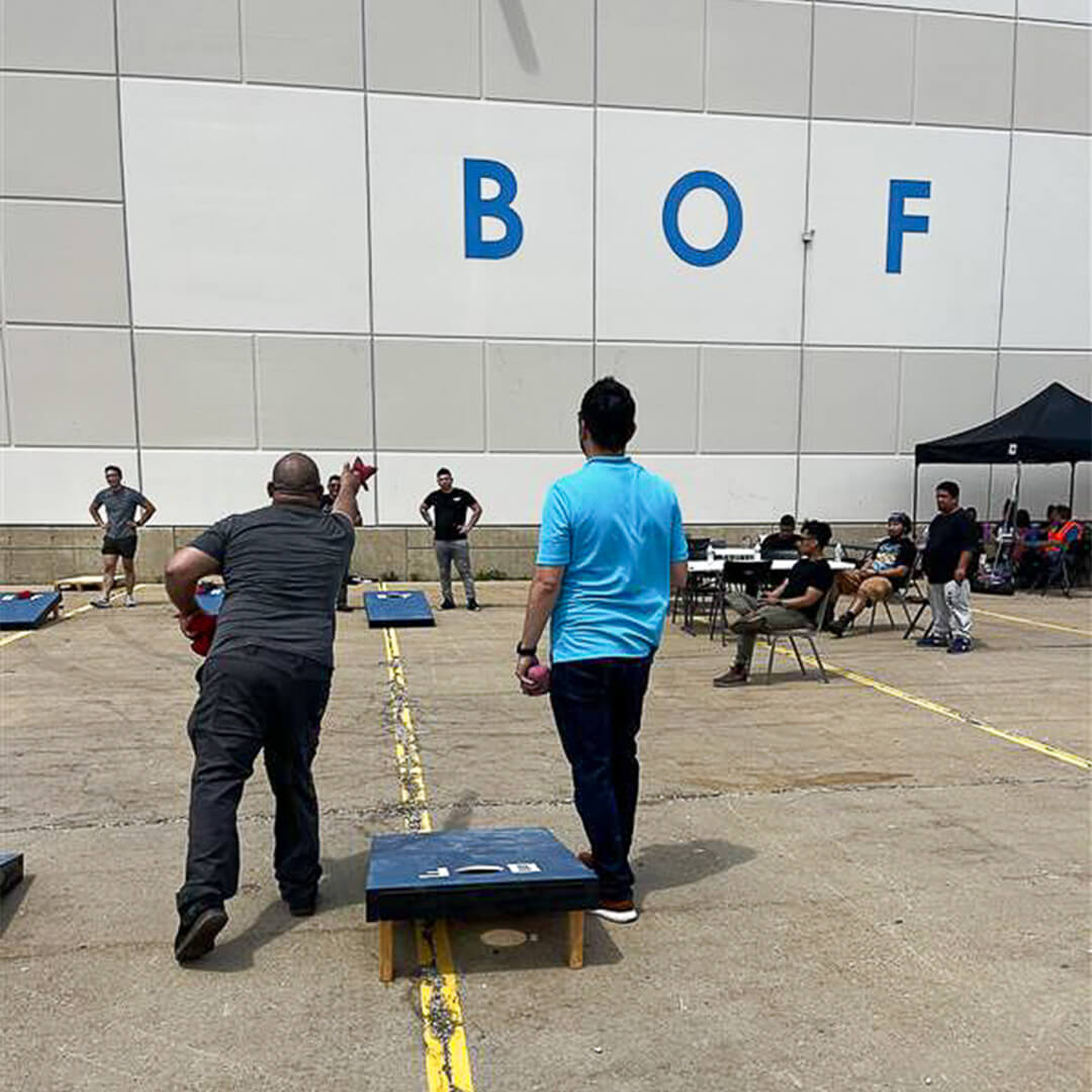 BOF employees playing bags at a company event