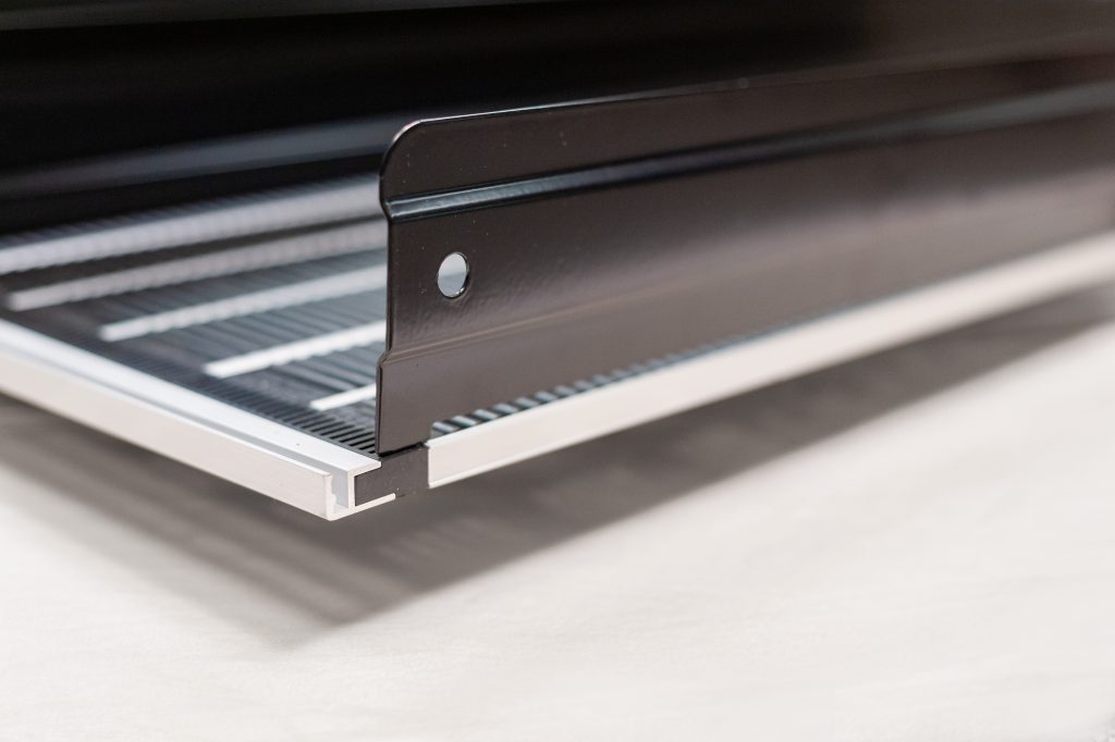 A close up of a gravity flow shelf